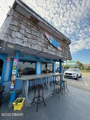 3000 Ocean Shore Blvd Unit 15, Ormond Beach, FL 32176 - exterior space with outdoor dry bar