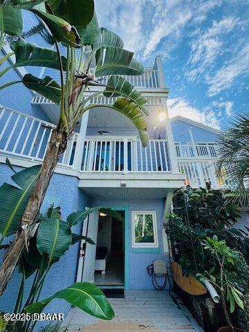 3000 Ocean Shore Blvd Unit 15, Ormond Beach, FL 32176 - rear view of property with a balcony