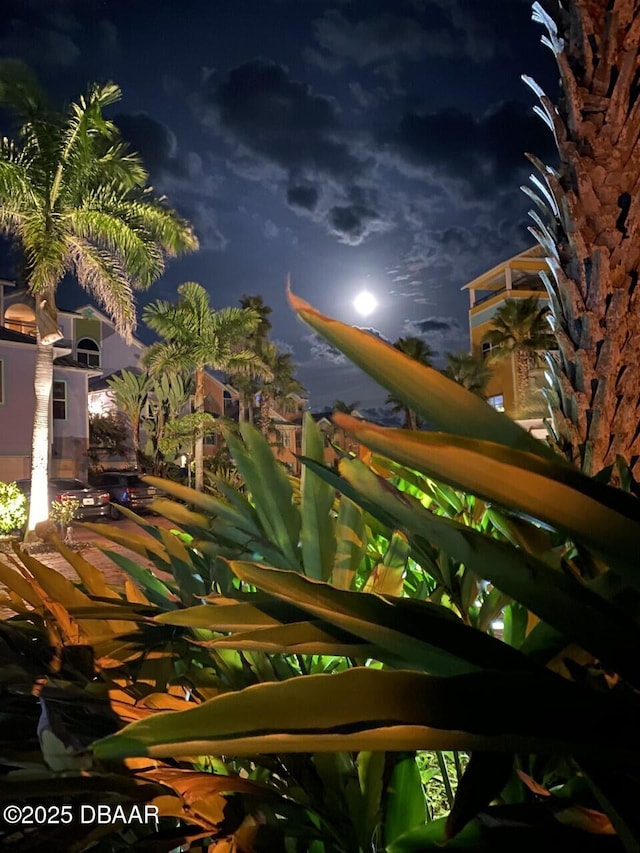 3000 Ocean Shore Blvd Unit 15, Ormond Beach, FL 32176 - view of balcony at twilight