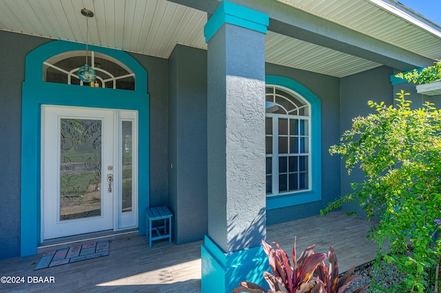 entrance to property with covered porch