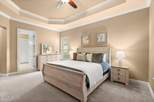 612 Aldenham Ln, Ormond Beach, FL 32174 - bedroom featuring a raised ceiling, carpet flooring, crown molding, baseboards, and a ceiling fan