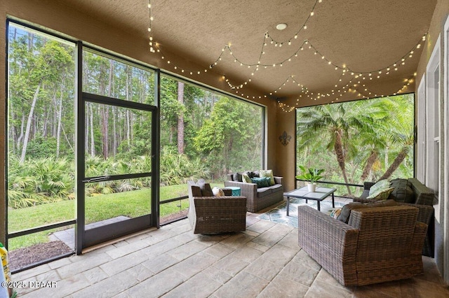 612 Aldenham Ln, Ormond Beach, FL 32174 - sunroom featuring an outdoor hangout area and ceiling fan