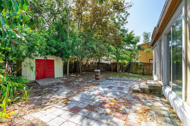 1011 S Peninsula Dr, Daytona Beach, FL 32118 - fenced backyard with a patio area