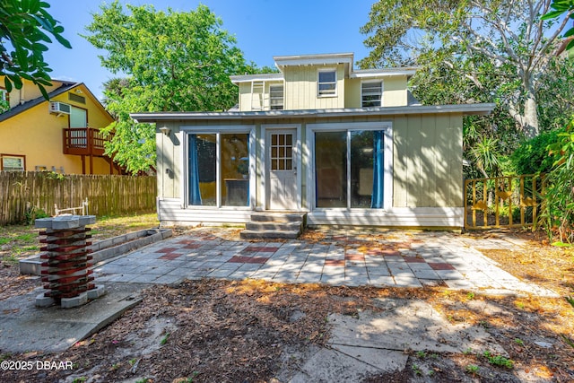 1011 S Peninsula Dr, Daytona Beach, FL 32118 - rear view of property featuring a patio and entry steps