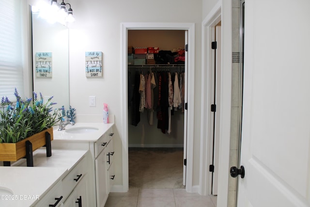 bathroom with vanity and tile patterned flooring