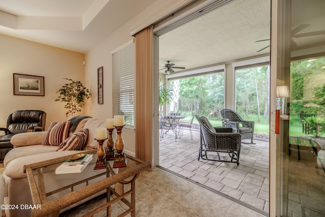 living room featuring ceiling fan