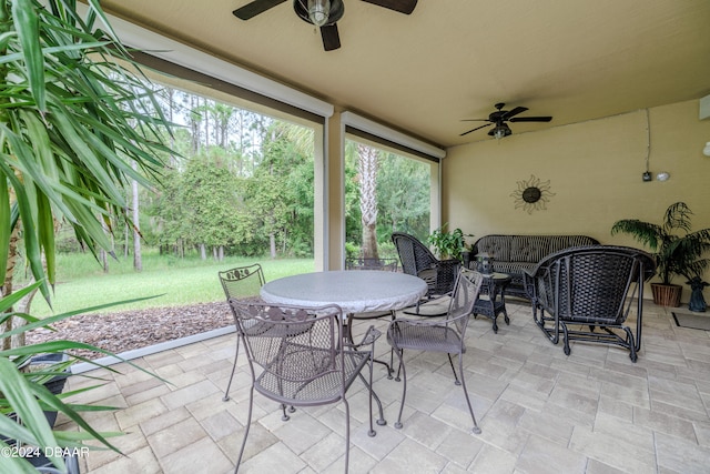 view of patio with an outdoor hangout area and ceiling fan