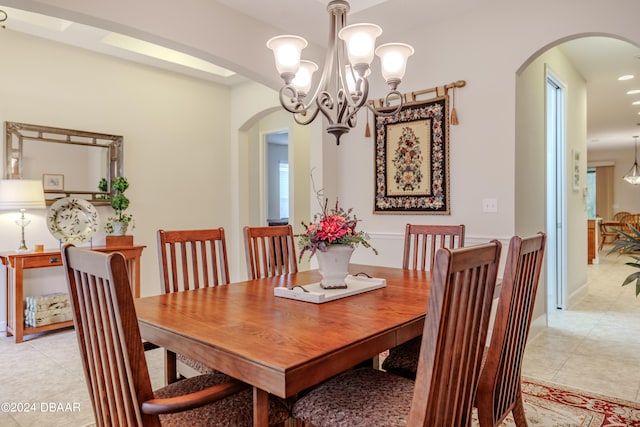 dining area with light tile patterned floors