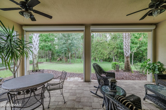 view of patio featuring ceiling fan