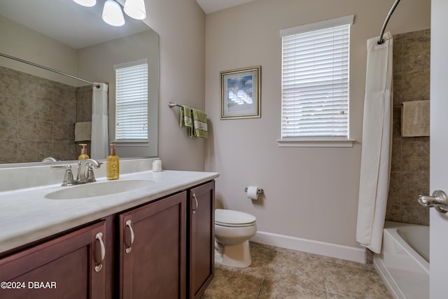 full bathroom featuring vanity, shower / tub combo with curtain, tile patterned flooring, and toilet