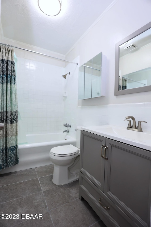 full bathroom with tile patterned flooring, ornamental molding, vanity, shower / bath combo, and toilet