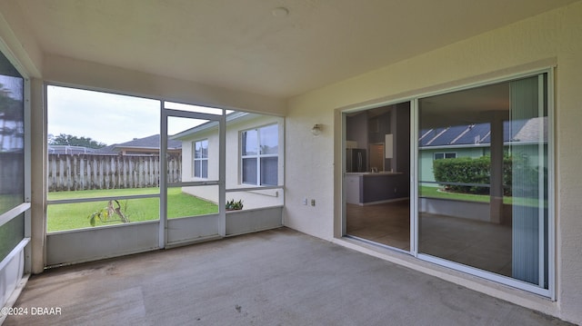 view of unfurnished sunroom