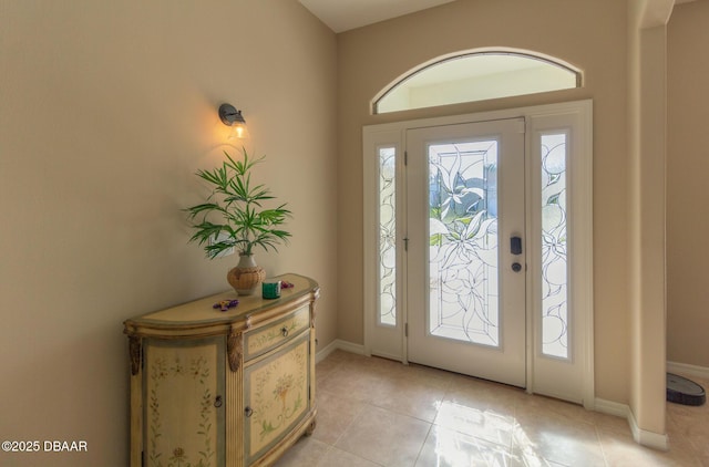 foyer with light tile patterned flooring