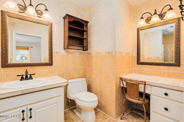 21 Pine Valley Cir, Ormond Beach, FL 32174 - bathroom featuring vanity and tile walls