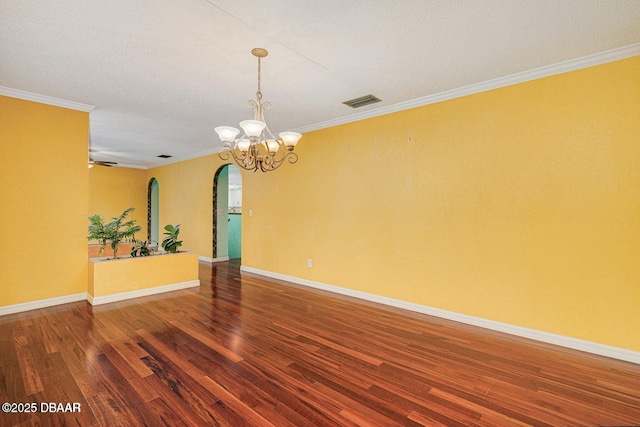 21 Pine Valley Cir, Ormond Beach, FL 32174 - empty room with arched walkways, wood finished floors, ornamental molding, a chandelier, and a textured ceiling