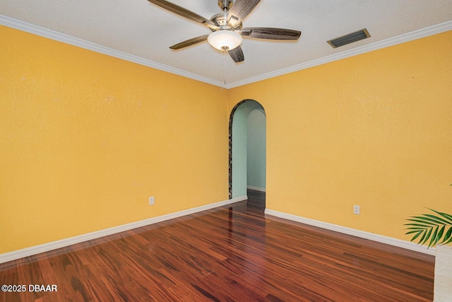 21 Pine Valley Cir, Ormond Beach, FL 32174 - empty room featuring arched walkways, wood finished floors, a ceiling fan, and ornamental molding