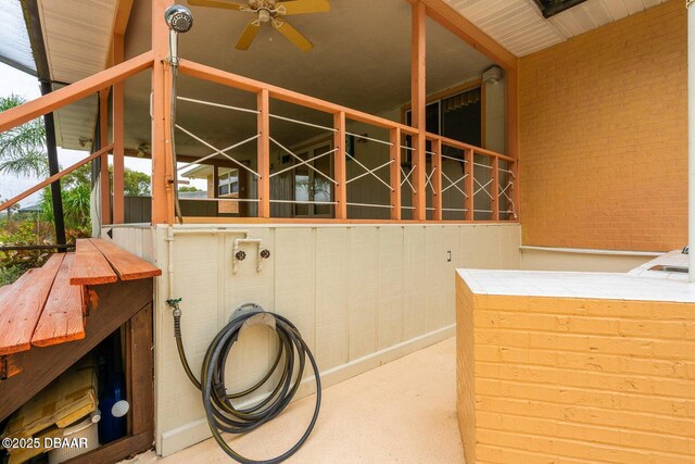21 Pine Valley Cir, Ormond Beach, FL 32174 - laundry area featuring ceiling fan and carpet