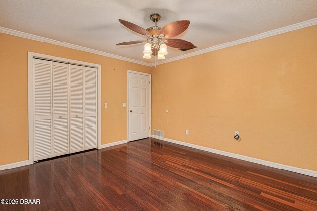 21 Pine Valley Cir, Ormond Beach, FL 32174 - unfurnished bedroom with wood finished floors, crown molding, a closet, and ceiling fan