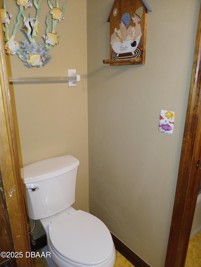 bathroom featuring toilet