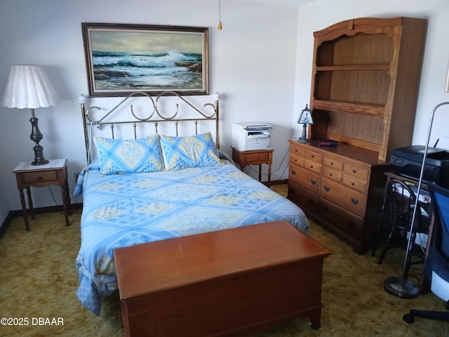 bedroom featuring dark colored carpet