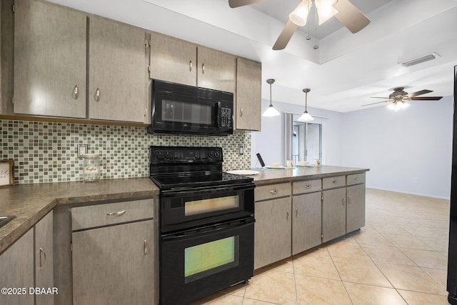 kitchen with light tile patterned floors, visible vents, decorative backsplash, black appliances, and dark countertops