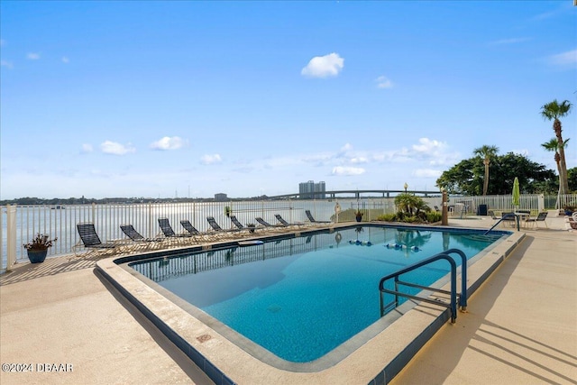 145 N Halifax Ave Unit 707, Daytona Beach, FL 32118 - community pool featuring a patio area and a water view