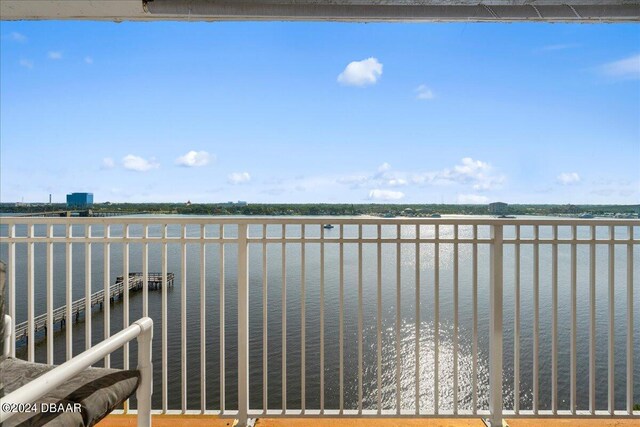 balcony featuring a water view