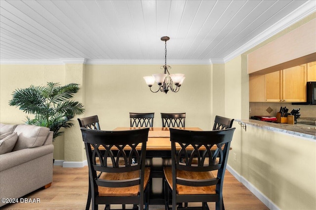 dining area featuring an inviting chandelier, light hardwood / wood-style flooring, ornamental molding, and wooden ceiling