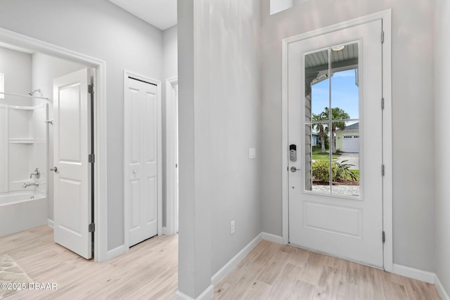 586 Lost Shaker Way, Daytona Beach, FL 32124 - entrance foyer featuring light wood-style flooring and baseboards