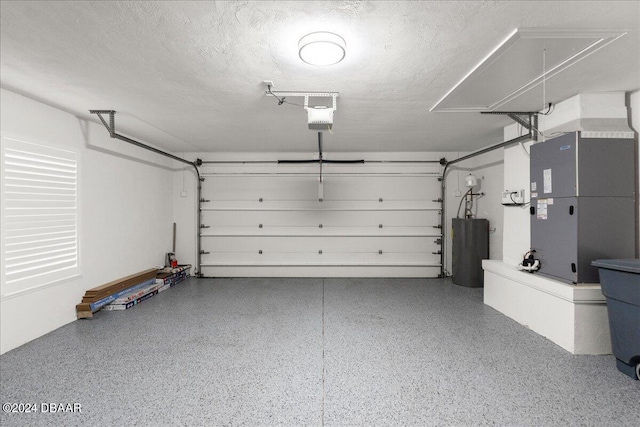 garage with a garage door opener and heating unit