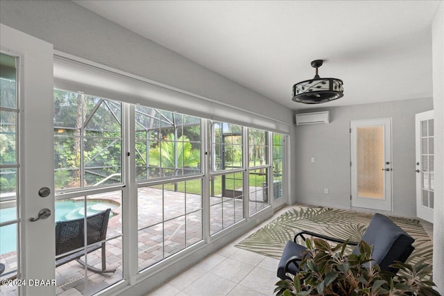 sunroom / solarium with a wall mounted AC