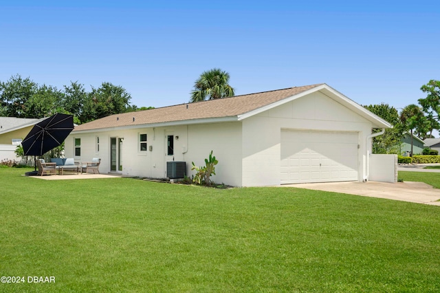 back of property with cooling unit, a patio, and a yard