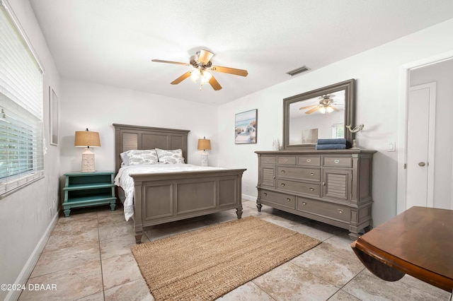 bedroom featuring ceiling fan