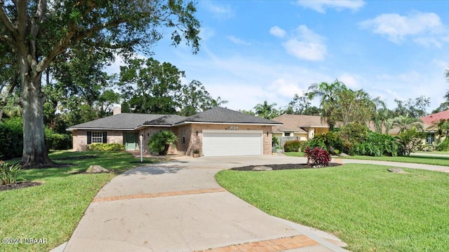 ranch-style house featuring a garage and a front yard