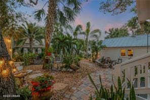 view of yard at dusk