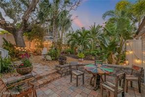 view of patio terrace at dusk