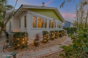 view of property exterior at dusk