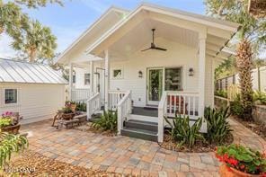 rear view of house featuring a patio