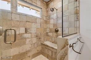 bathroom with an enclosed shower