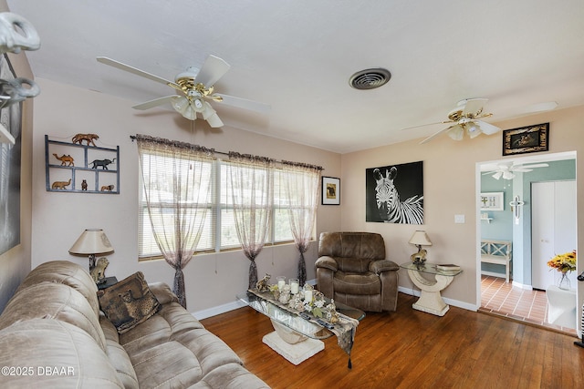 living room with dark hardwood / wood-style flooring