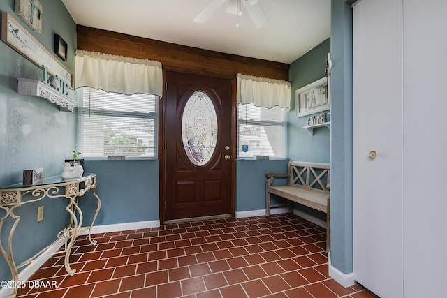 foyer featuring ceiling fan