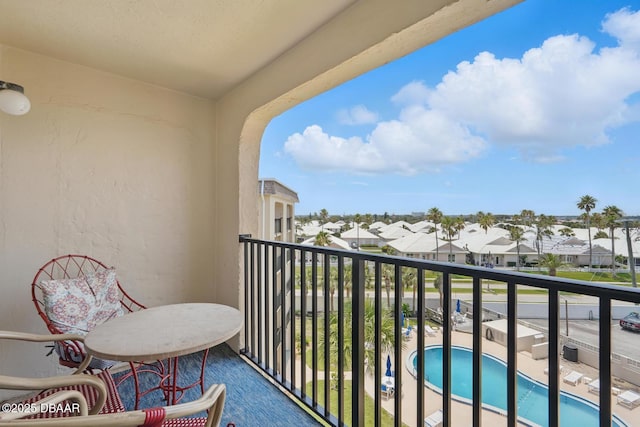 2626 S Atlantic Ave Unit 505, Daytona Beach, FL 32118 - balcony with a residential view and view of pool