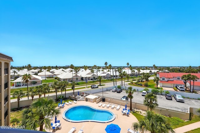 2626 S Atlantic Ave Unit 505, Daytona Beach, FL 32118 - community pool featuring a residential view and a patio