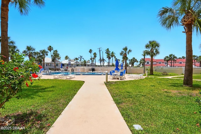 2626 S Atlantic Ave Unit 505, Daytona Beach, FL 32118 - view of home's community with a swimming pool and a patio
