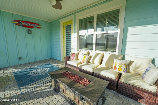 view of patio featuring an outdoor fire pit