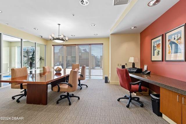 office area featuring light carpet and a notable chandelier