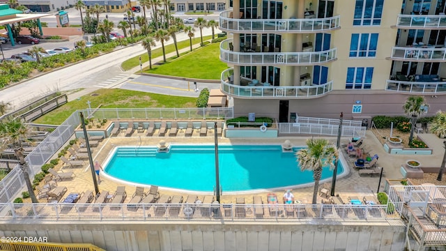 view of swimming pool featuring a patio area