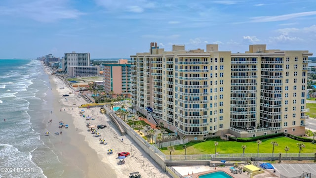 drone / aerial view with a view of the beach and a water view