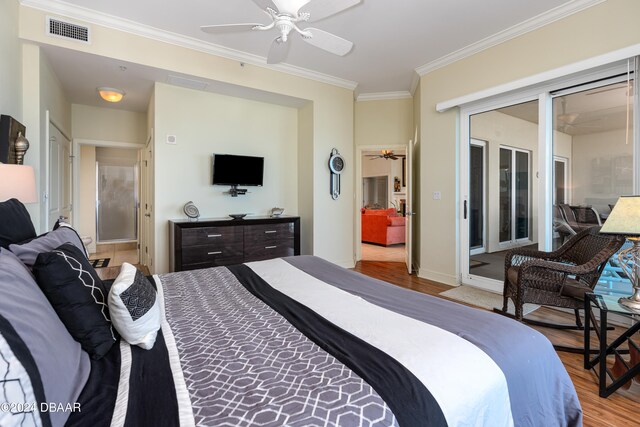 bedroom with ceiling fan, ornamental molding, and light hardwood / wood-style flooring