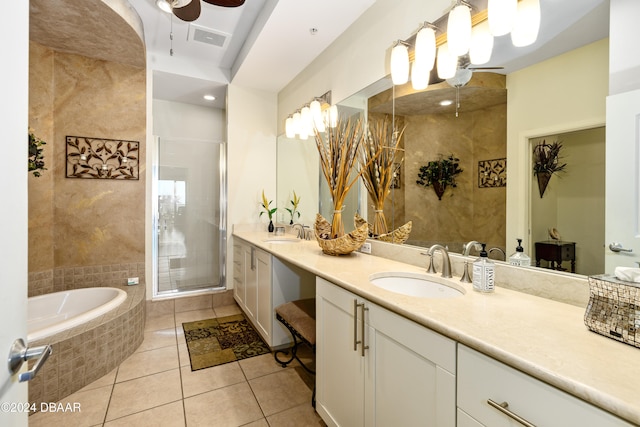 bathroom with shower with separate bathtub, vanity, tile patterned floors, and ceiling fan